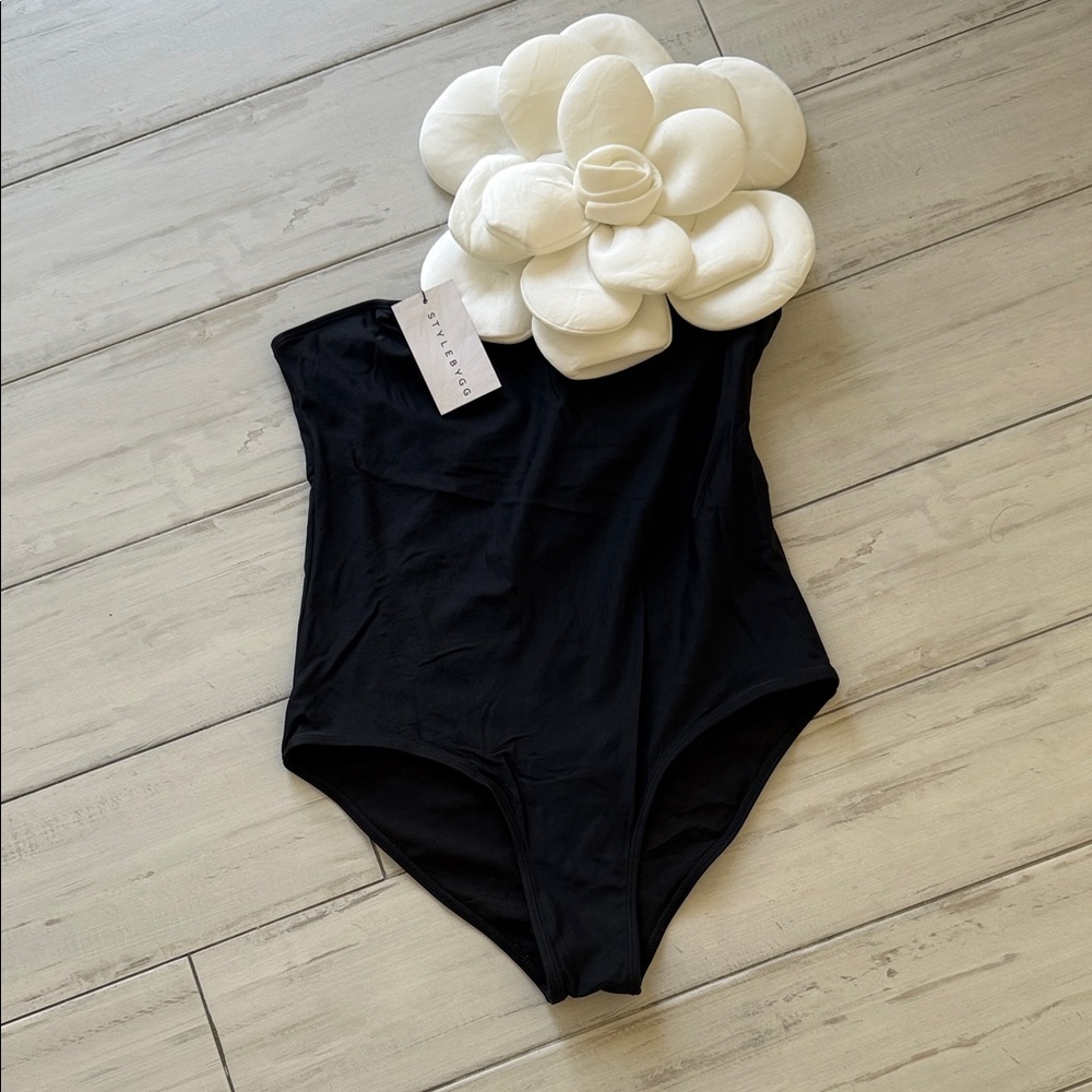 Black One-Piece Swimsuit with White Floral Accent